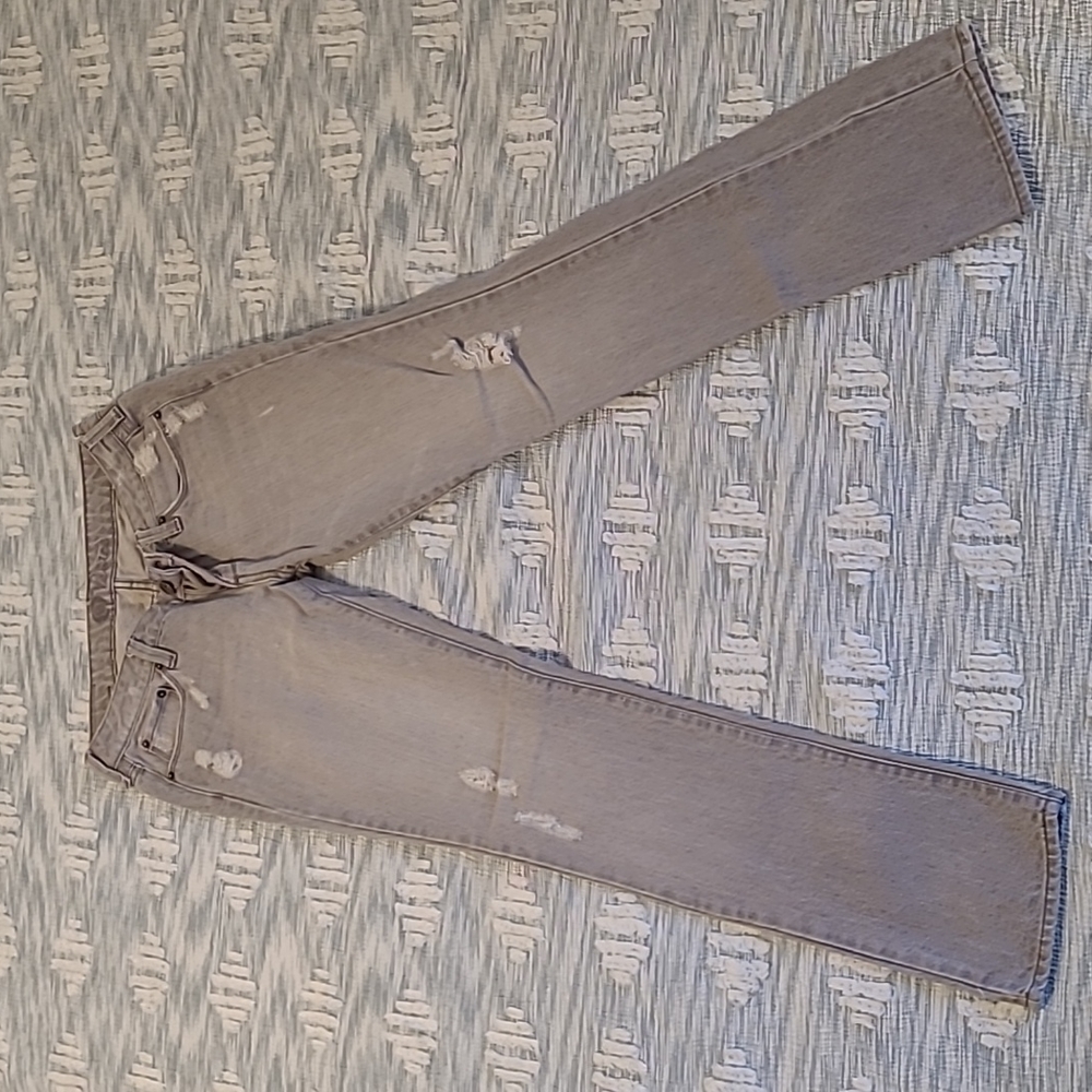 Distressed light grey skinny jeans